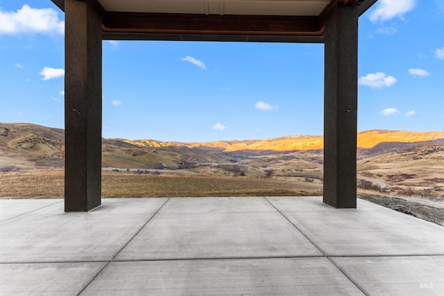 view of patio with a mountain view