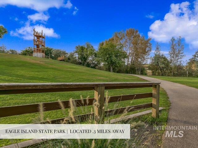 680 N Delehaye Ave, Eagle, ID 83616 - view of home's community with a lawn and fence