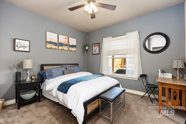 bedroom featuring baseboards, carpet, and ceiling fan