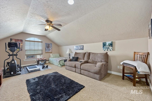 living room featuring lofted ceiling, carpet, baseboards, and a textured ceiling