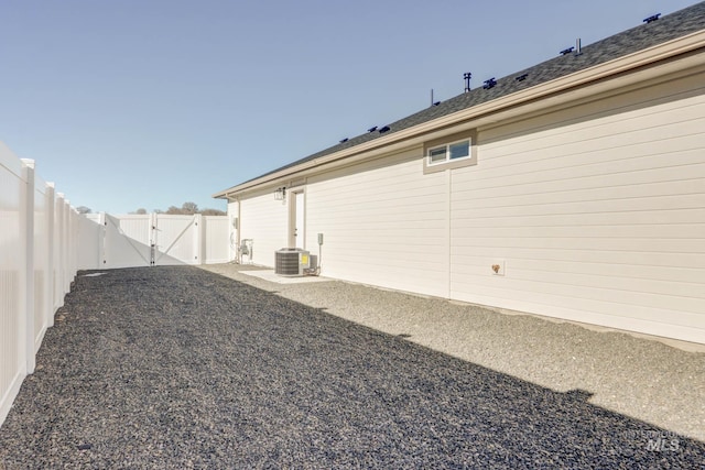 view of yard featuring central AC