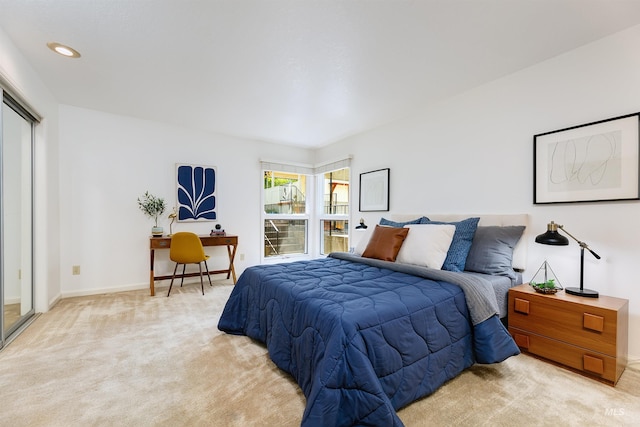 1574 E Sendero Ln, Boise, ID 83712 - bedroom with light colored carpet, an office area, and baseboards