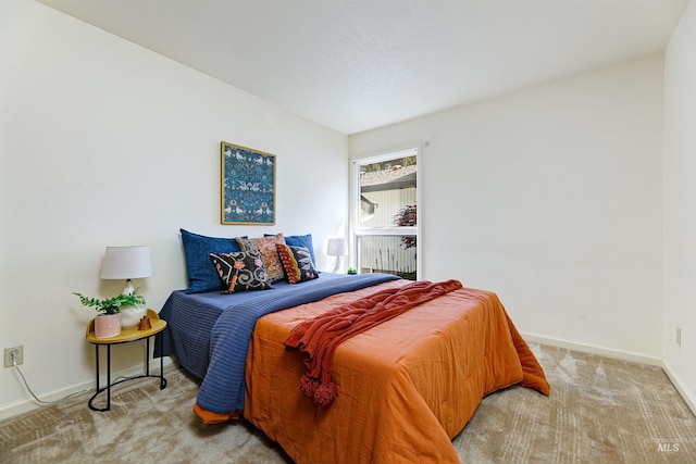 1574 E Sendero Ln, Boise, ID 83712 - bedroom featuring baseboards and carpet flooring