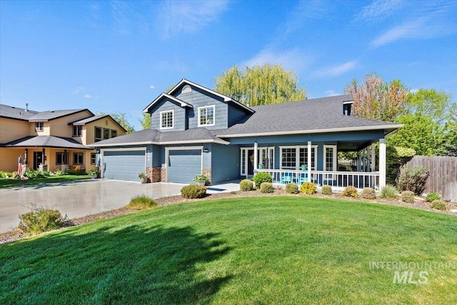 view of front of property with a front lawn, fence, covered porch, concrete driveway, and an attached garage