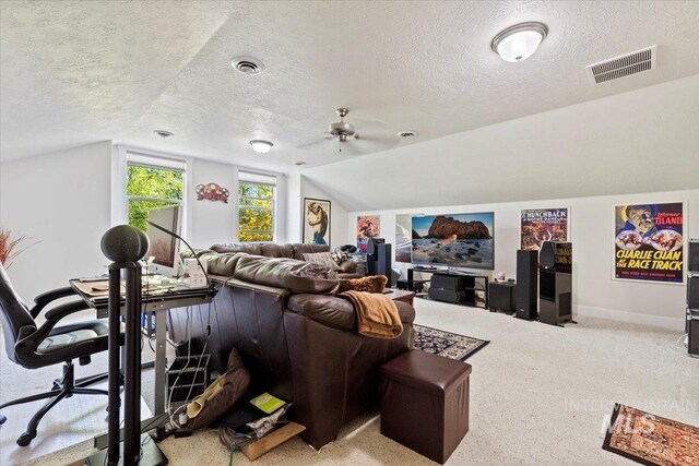 carpeted living room with baseboards, lofted ceiling, a textured ceiling, and visible vents