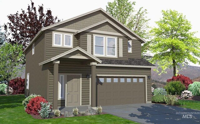 craftsman-style home with a garage and a front yard