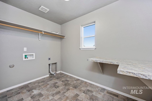 laundry area featuring washer hookup and electric dryer hookup