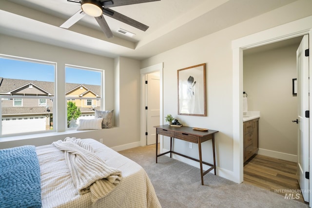 1154 S Barberry Pl, Nampa, ID 83686 - bedroom with baseboards, light colored carpet, ensuite bath, and a ceiling fan