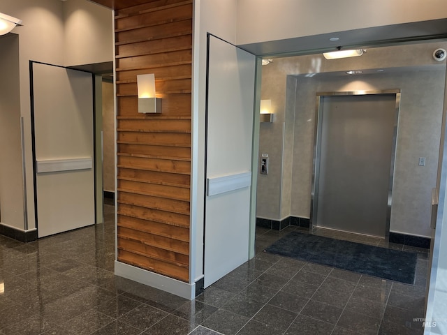 199 N Capitol Blvd, Boise, ID 83702 - bathroom featuring granite tiled floors, baseboards, and elevator