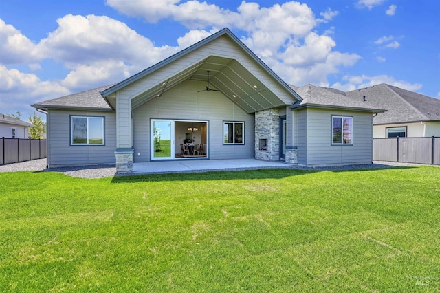5696 W Polecat Dr, Eagle, ID 83616 - rear view of house with a patio area and a shingled roof