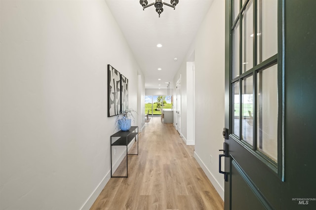 5696 W Polecat Dr, Eagle, ID 83616 - hallway with light wood-style floors, baseboards, and recessed lighting