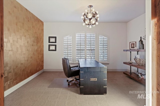 home office featuring a notable chandelier and baseboards