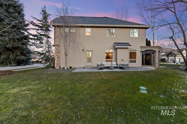 rear view of property featuring a patio area, a lawn, and outdoor lounge area