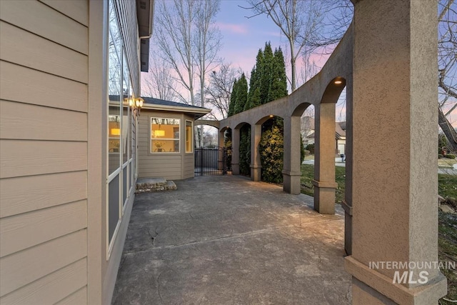 view of patio / terrace with a gate