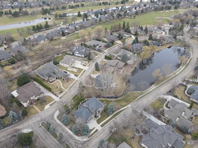 aerial view featuring a residential view and a water view