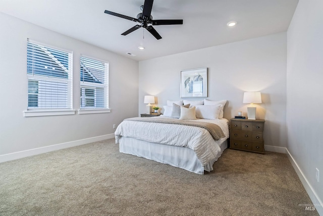 carpeted bedroom featuring visible vents, recessed lighting, a ceiling fan, and baseboards