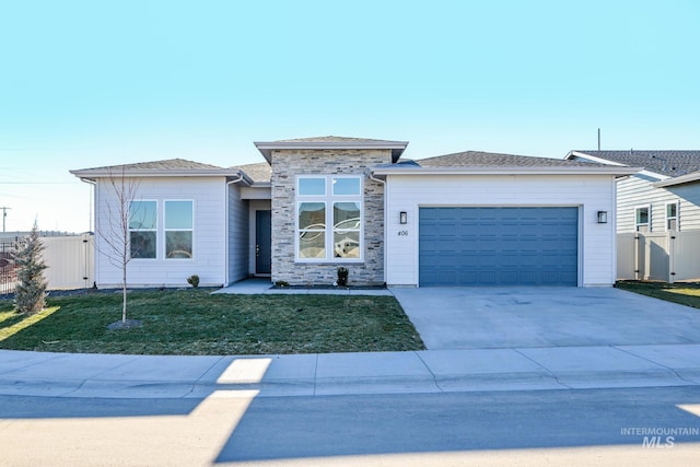 view of front facade with a front lawn and a garage