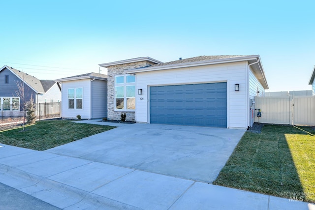 ranch-style house with a front yard and a garage