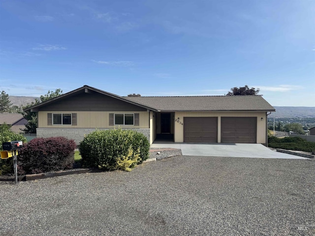 2634 Laurel Ct, Clarkston, WA 99403 - ranch-style house with an attached garage and concrete driveway