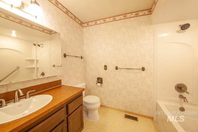 2634 Laurel Ct, Clarkston, WA 99403 - bathroom with toilet, vanity, shower / washtub combination, and baseboards