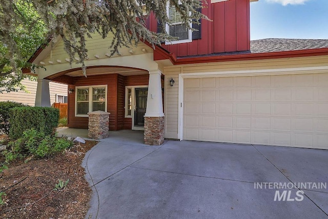 3650 N Park Crossing Ave, Meridian, ID 83646 - view of front of property with board and batten siding, driveway, and covered porch