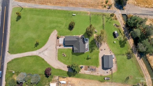 birds eye view of property featuring a rural view