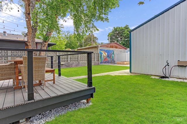 312 4th Ave, Lewiston, ID 83501 - view of yard featuring a deck and an outbuilding