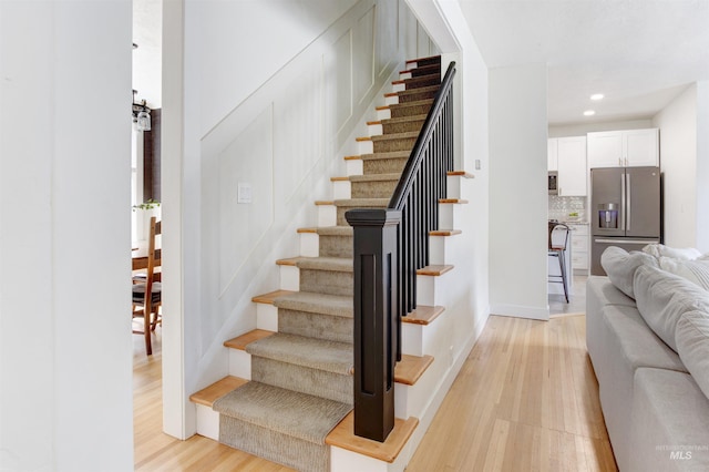 312 4th Ave, Lewiston, ID 83501 - stairs with wood finished floors and recessed lighting