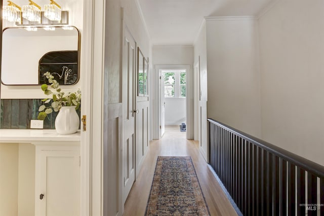 312 4th Ave, Lewiston, ID 83501 - corridor featuring light wood finished floors, a chandelier, and crown molding