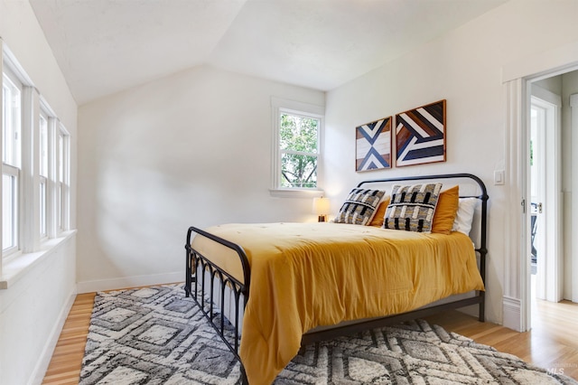 312 4th Ave, Lewiston, ID 83501 - bedroom featuring light wood-style flooring, lofted ceiling, and baseboards