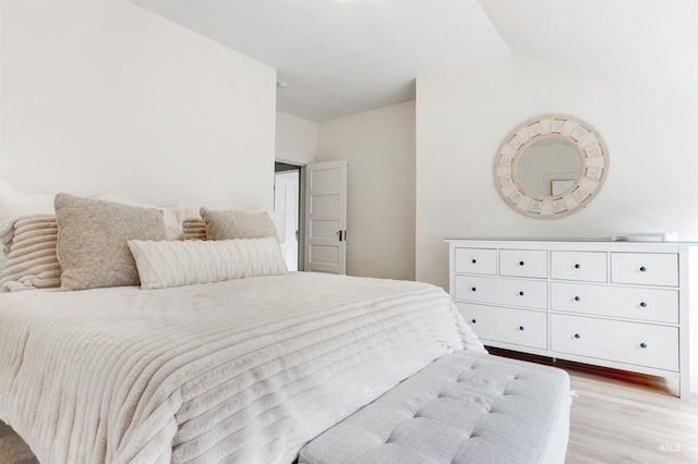 312 4th Ave, Lewiston, ID 83501 - bedroom featuring light wood-type flooring and vaulted ceiling