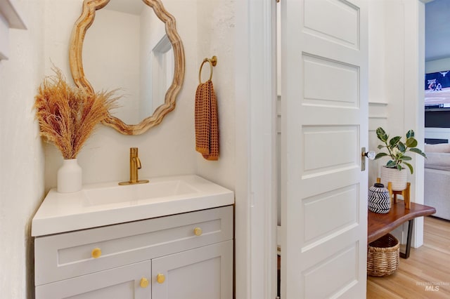 312 4th Ave, Lewiston, ID 83501 - bathroom with wood finished floors and vanity