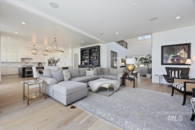 8 River Run Ests, Burley, ID 83318 - living room with light wood-style flooring, a chandelier, and recessed lighting