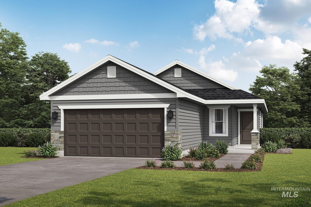 1574 Witt, Mountain Home, ID 83647 - view of front facade featuring a garage and a front lawn
