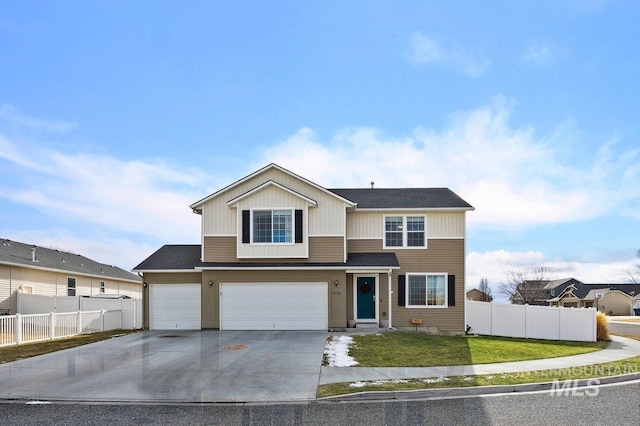 view of front property featuring a garage and a front lawn