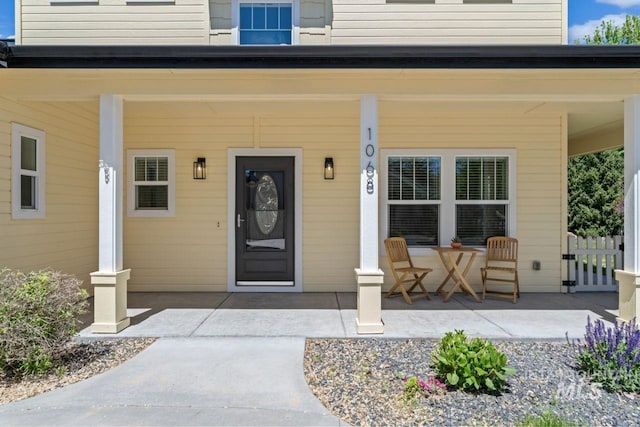 doorway to property with covered porch