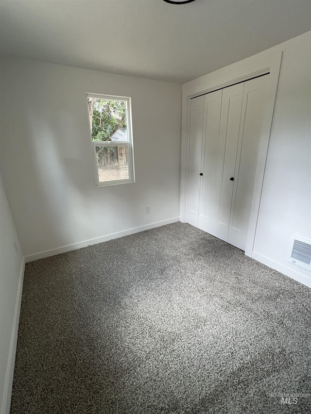 956 8th Ave N, Payette, ID 83661 - unfurnished bedroom with a closet and carpet flooring