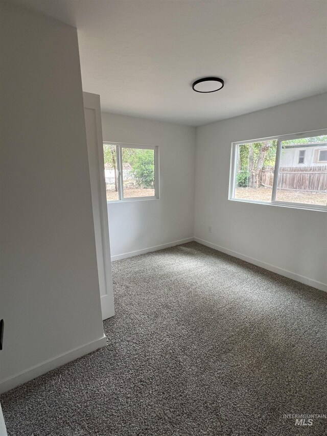 956 8th Ave N, Payette, ID 83661 - carpeted spare room featuring plenty of natural light