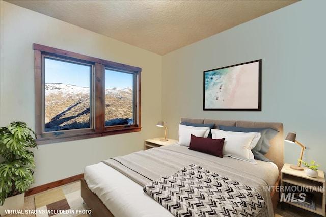 bedroom with a textured ceiling