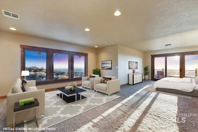 interior space with a textured ceiling