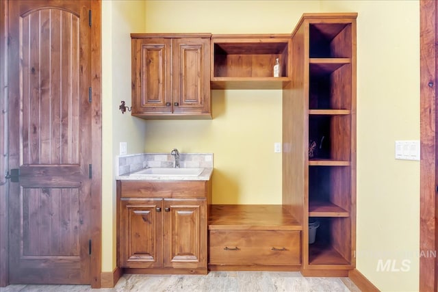 laundry area with sink