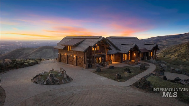 cabin featuring a garage