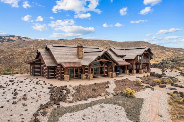 log home with a mountain view