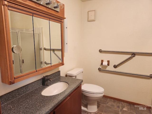 bathroom with an enclosed shower, toilet, and vanity