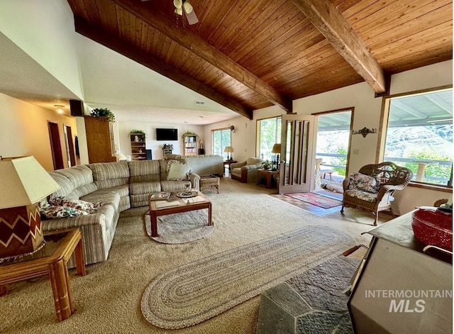 carpeted living room with wood ceiling, high vaulted ceiling, ceiling fan, and beam ceiling