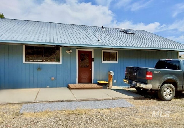 view of front of home featuring metal roof