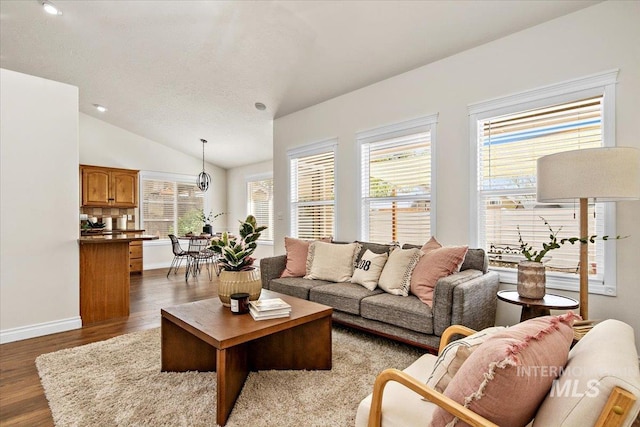 8613 W Thunder Mountain Dr, Boise, ID 83709 - living room featuring lofted ceiling, wood finished floors, recessed lighting, and baseboards