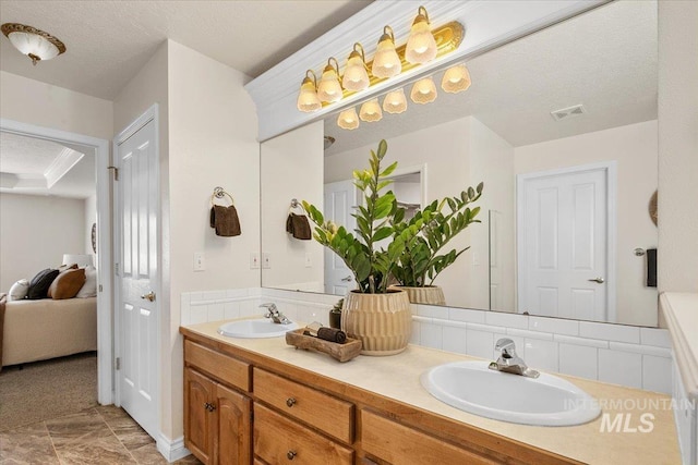 8613 W Thunder Mountain Dr, Boise, ID 83709 - full bathroom featuring double vanity, a sink, connected bathroom, and visible vents