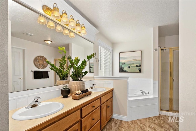 8613 W Thunder Mountain Dr, Boise, ID 83709 - full bathroom with a stall shower, double vanity, a sink, and a bath