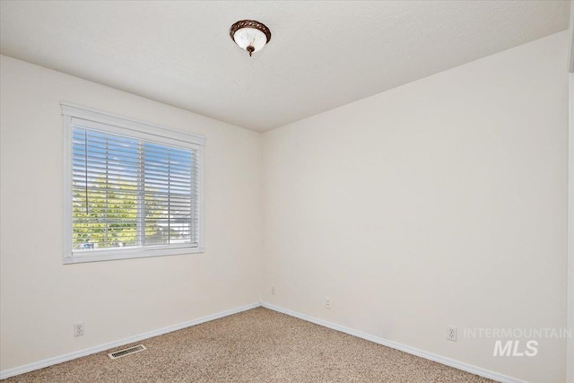 8613 W Thunder Mountain Dr, Boise, ID 83709 - unfurnished room featuring visible vents, carpet flooring, and baseboards
